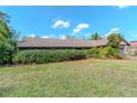 Charming one-story home featuring well-maintained front yard landscaping at 5101 Estates Cir, Sarasota, FL 34243