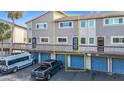 Townhome features a private garage and outdoor access to living space at 6317 Newtown Cir # 17B2, Tampa, FL 33615