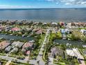 A stunning coastal community with luxury homes, canals, and breathtaking ocean views stretching to the horizon at 6467 Rubia Cir, Apollo Beach, FL 33572