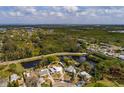 This aerial view shows the home and its location with convenient access to nearby lakes at 8001 Orient Ne Way, St Petersburg, FL 33702