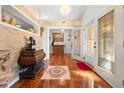 Inviting foyer showcasing decorative tile flooring, elegant accents, and a view into the formal living areas at 8518 Delaware Dr, Weeki Wachee, FL 34607