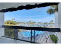 Relaxing balcony overlooking a community pool and the beautiful inter coastal waterway at 12055 3Rd E St # 103, Treasure Island, FL 33706