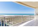 Enjoy breathtaking ocean views from this spacious balcony with white tile flooring and metal railing at 1200 Gulf Blvd # 902, Clearwater Beach, FL 33767