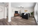 Cozy living room with modern furnishings, wood-look floors, and a bright, inviting atmosphere at 4346 10Th N Ave, St Petersburg, FL 33713