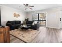 Inviting living room featuring stylish décor, new floors, and lots of natural light at 4346 10Th N Ave, St Petersburg, FL 33713
