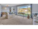 Bright living room with large windows offering plenty of natural light at 811 Helmsman Way, Palm Harbor, FL 34685