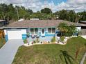 Well-maintained home with fresh paint, landscaped yard, and an inviting entrance at 2915 67Th Way N, St Petersburg, FL 33710