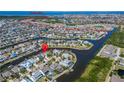 Waterfront property on canal with Tampa Bay access, marked with red pin and dashed lines at 5616 Seagrass Pl, Apollo Beach, FL 33572