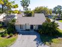 Inviting single story home with mature landscaping and a private driveway at 25 Windrush Bay Dr # 25, Tarpon Springs, FL 34689