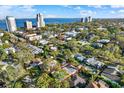 A panoramic aerial view of the property's location near the ocean with surrounding neighborhood and city landscape at 3112 S Julia Cir, Tampa, FL 33629