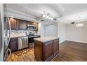 Kitchen with granite countertops, stainless steel appliances, and tile backsplash at 5220 Brittany S Dr # 1409, St Petersburg, FL 33715