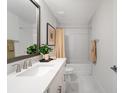 Modern bathroom featuring white marble floors, shower and tub with modern fixtures at 4511 S Manhattan Ave # 32, Tampa, FL 33611