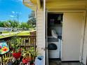 Convenient patio closet featuring a washer and dryer, adding practicality and convenience to the living space at 2213 65Th N Ave # 2213, St Petersburg, FL 33702