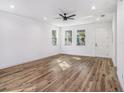 Bright living room with recessed lighting and wood-look floors at 3405 Phillips St, Tampa, FL 33619