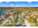 Breathtaking aerial view of Coquina Key neighborhood, water and city skyline at 4401 Neptune Se Dr, St Petersburg, FL 33705