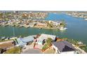 Waterfront home with dock access, nestled in a vibrant coastal community at 13 Bellevue Dr, Treasure Island, FL 33706