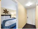 Cozy bedroom with a large bed, and decor at 2506 N Rocky Point Dr # 242, Tampa, FL 33607