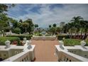 Beautiful exterior view showcasing manicured greenery and trees in a garden setting at 820 Druid S Rd, Clearwater, FL 33756