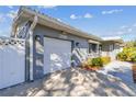 Charming home featuring a one-car garage, a well-maintained yard, and a freshly painted exterior at 1269 80Th N Ave, St Petersburg, FL 33702
