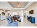 The stylish living room offers an open floor plan, plenty of natural light, and comfortable seating for Gathering time at 11424 Drifting Leaf Dr, Riverview, FL 33579