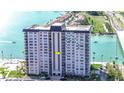 High-rise condo building overlooking the water, offering beautiful waterfront views and modern architecture at 5220 Brittany S Dr # 807, St Petersburg, FL 33715