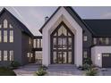 Elegant two-story home featuring a unique, modern design and meticulously landscaped surroundings at 8 Avonwood, Tampa, FL 33625