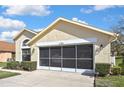 Charming single-story home featuring a two car screened garage with a freshly sealed driveway at 11321 Copley Ct, Spring Hill, FL 34609