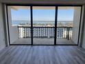 Spacious balcony overlooking a stunning waterfront view from a condo in the building at 400 Island Way # 908, Clearwater Beach, FL 33767