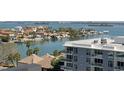 Beautiful waterfront view overlooking the water, boats, and residential area at 400 Island Way # 908, Clearwater Beach, FL 33767