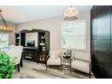 Comfortable living area with a large window and contemporary decor at 9211 Seeger Ln, Land O Lakes, FL 34638
