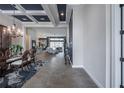 Long Foyer showcasing an open floorplan with a dining area and a living space ahead at 4206 Tour Trce, Land O Lakes, FL 34638