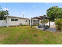 Beautiful backyard featuring a modern patio with stylish furniture and lush landscaping at 4500 22Nd S Ave, St Petersburg, FL 33711