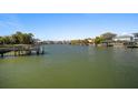 Beautiful waterfront community view showcasing the canal and surrounding neighborhood homes at 5105 W Longfellow Ave, Tampa, FL 33629