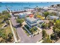 Aerial view showcases the property's location in a colorful beach community, with a marker indicating the home at 5402 31St S Ave, Gulfport, FL 33707