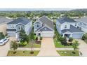 Aerial view of the home showcasing its well-maintained landscaping and neighborhood at 5614 Silver Sun Dr, Apollo Beach, FL 33572