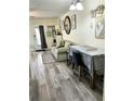 Cozy living room with neutral paint, dining table, and decorative items at 8080 112Th St # 206, Seminole, FL 33772