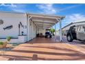 Covered carport providing ample parking space at 845 Jolanda Cir, Venice, FL 34285