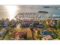 Aerial view of a resort and marina on the water with many docked boats at 6030 Printery St # 107, Tampa, FL 33616