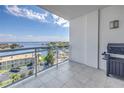 Enjoy the view from this private balcony featuring tile floors and a clear railing overlooking the waterfront at 1325 Snell Isle Ne Blvd # 611, St Petersburg, FL 33704