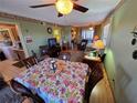 Inviting living and dining area with views of the kitchen and sliding glass doors to the lanai at 24862 Us Highway 19 N # 2906, Clearwater, FL 33763