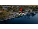 Waterfront property featuring a boat dock and convenient canal access at 56 Sandpiper Rd, Tampa, FL 33609
