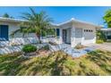 Close up of the well-maintained front of this single-story home, highlighting the home's charm and curb appeal at 8622 140Th Way, Seminole, FL 33776