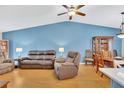 Inviting living space features comfortable seating, hardwood floors, and a seamless dining area at 11430 94Th St, Largo, FL 33773