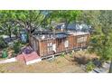 Stripped home features wood frame, no roof, and a small entrance landing at 3601 N 18Th St, Tampa, FL 33605