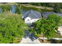 Beautiful home with mature trees and a pond view at 17923 Timber View St, Tampa, FL 33647