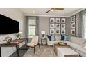 Well-lit living room featuring designer furnishings and a large TV for relaxing at 29863 Imperati Blvd, Wesley Chapel, FL 33543
