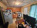 Functional kitchen features essential appliances and ample cabinet space at 4905 Horton Rd, Plant City, FL 33567