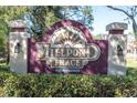 Millpond Trace community entrance sign with attractive landscaping and deed-restricted signage at 7807 Hardwick Dr # 115, New Port Richey, FL 34653