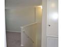 Hallway showcasing access to the second floor at 10111 Rosemary Leaf Ln, Riverview, FL 33578