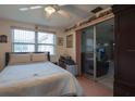 Cozy bedroom featuring ample natural light and closet space at 1623 Dartmouth Dr, Holiday, FL 34691